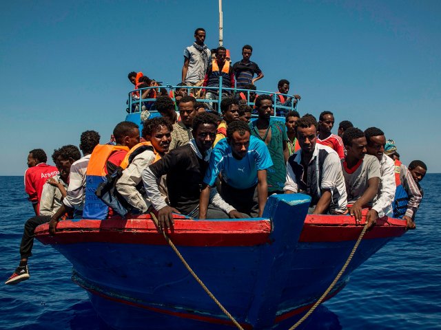 europe immigration boats non-white fighting-age males